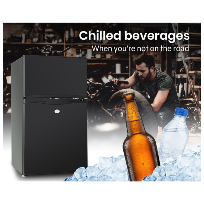 Black refrigerator with bottles of beer and water on ice, text 'Chilled beverages When you're not on the road'.
