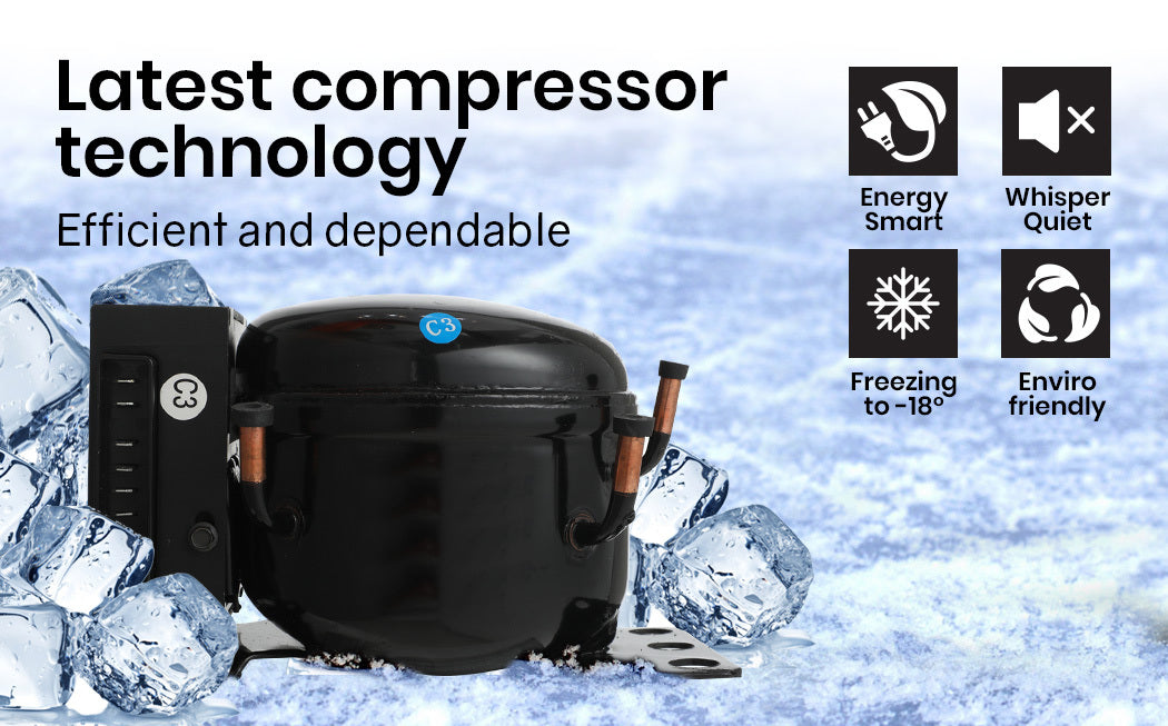Black compressor cooler surrounded by ice cubes with features highlighted on a snowy background