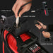 Step-by-step guide on using a 12V electric winch with red cables and a handheld tool.