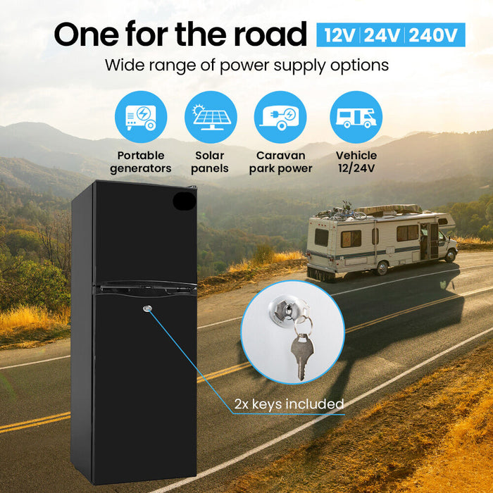 Black power supply unit with key on a road scene with an RV and power icons.