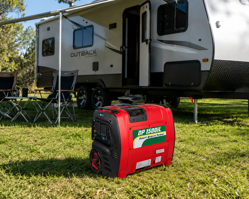 Red portable generator on grass with an RV in the background