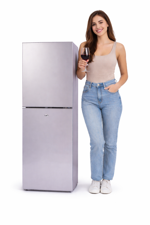 Caravan fridge freezer with woman holding a glass of red wine