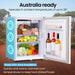 Caravan fridge freezer with text about operating temperature and insulation.