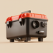 Black and orange diesel air heater with a fan and valve