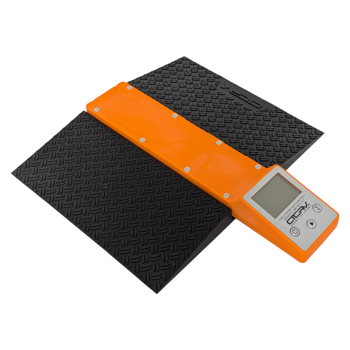 Orange electronic scale with black textured ramp