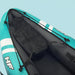 Inflatable kayak with teal and black design