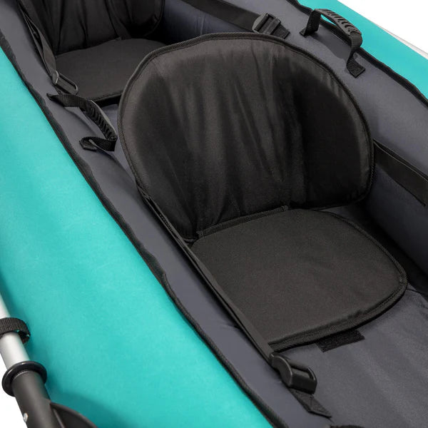 Black kayak seat pad on a teal kayak