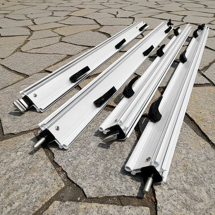 Set of components for awning flap eliminator kit