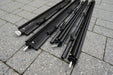 Set of components for awning flap eliminator kit