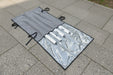 Components for awning flap eliminator kit in carry bag