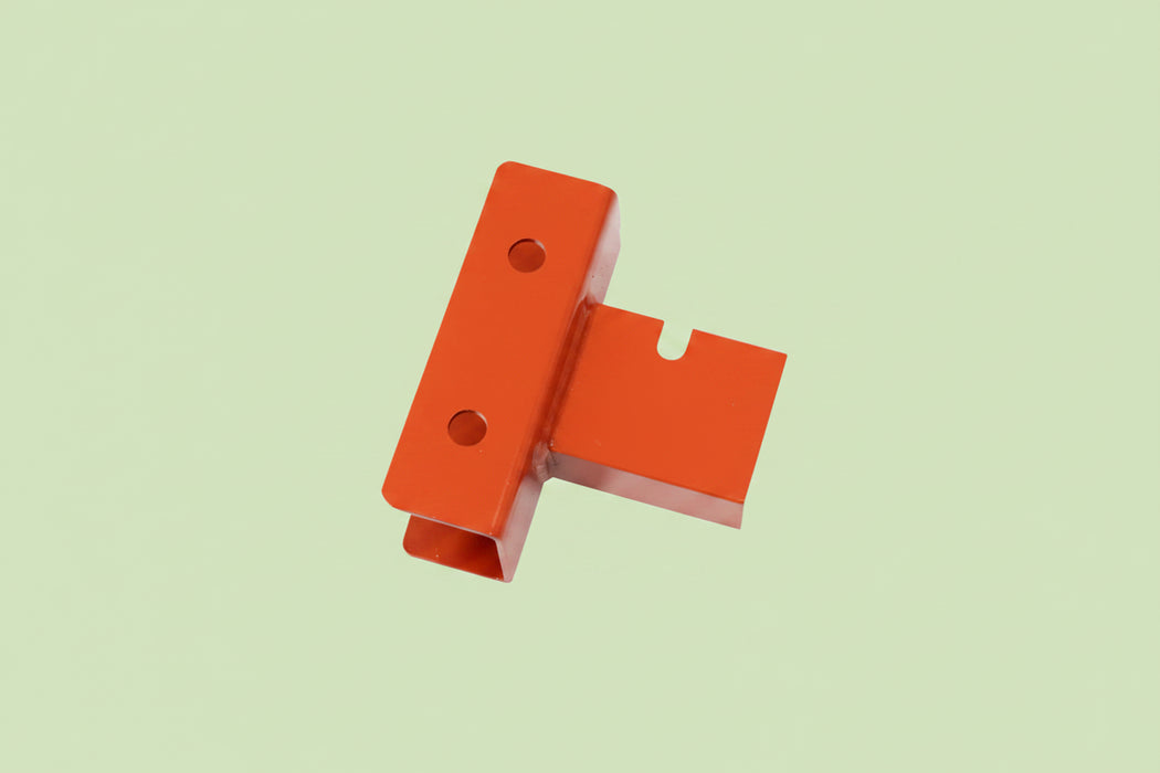 Orange metal bracket for caravan jack