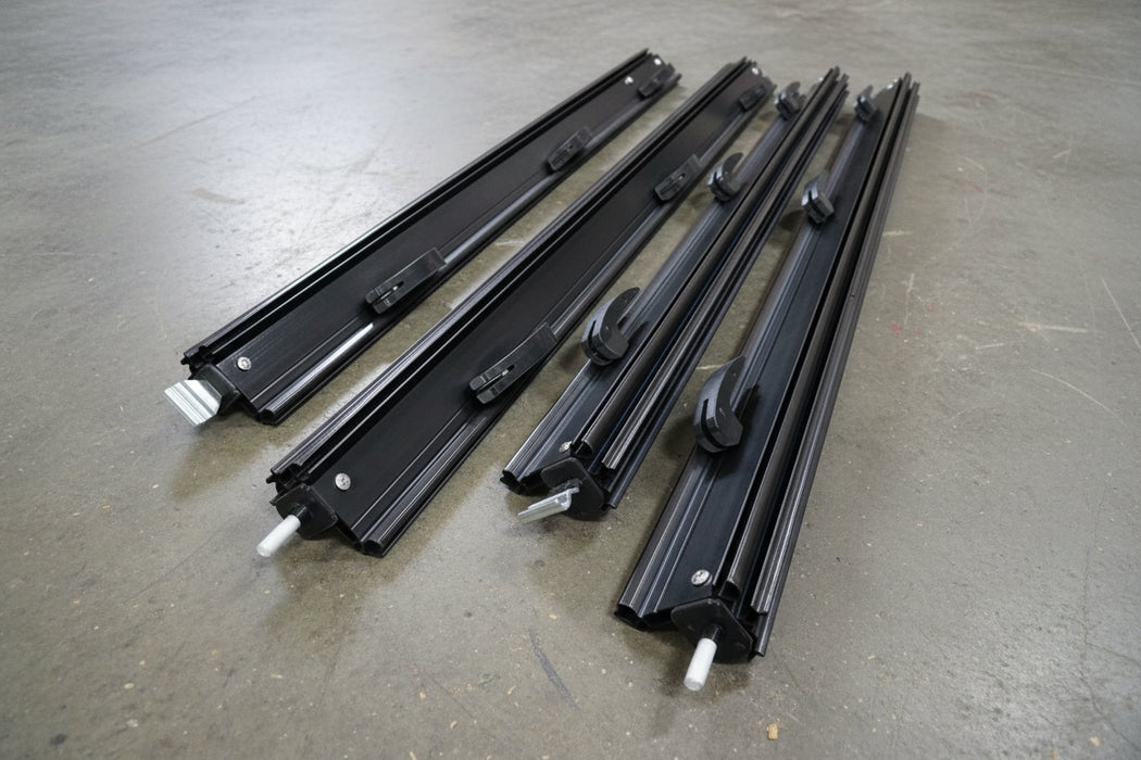 Components for black awning flap eliminator kit