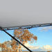 Caravan awning showing white flap eliminator kit