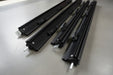 Black metal components for awning flap eliminator kit
