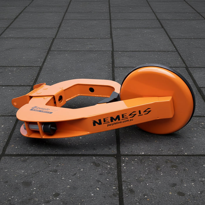 Orange wheel clamp with 'Nemesis' branding
