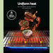 BBQ with food being cooked, highlighting uniform heat distribution and features.