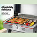 Barbecue with food showing dimensions