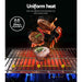 Grill with food being cooked, highlighting uniform heat distribution.