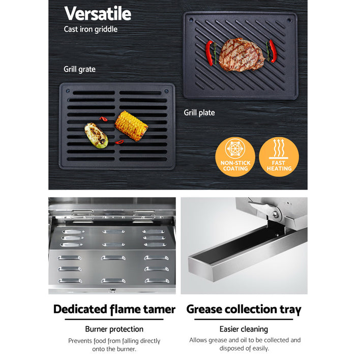 Versatile cast iron griddle with grill grate, plate, flame tamer, and grease collection tray.