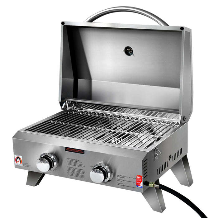 Stainless steel portable bbq on a white background