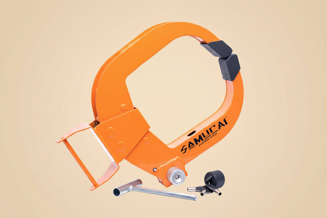 Orange anti-theft security kit with keys and tool